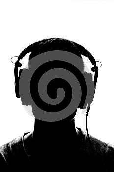 Male silhouette with headphones