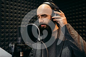 Male singer songs in audio recording studio