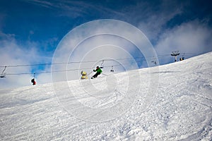 Male skier carving down an Australian ski slope