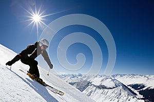 Male skier with mountain view
