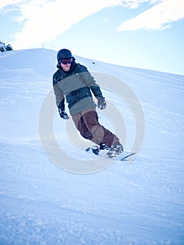 Male snowboarder with helmet photo