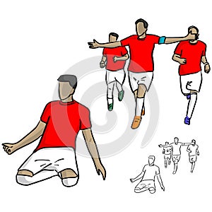 Male soccer player in red jersey shirt celebrating a goal with h