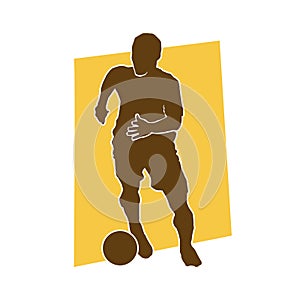 Male soccer player silhouette. silhouette of football player in action.