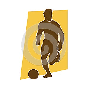 Male soccer player silhouette. silhouette of football player in action.