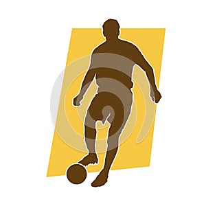 Male soccer player silhouette. silhouette of football player in action.