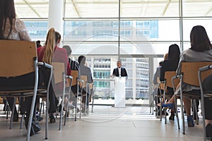 male speaker speaks in a business seminar