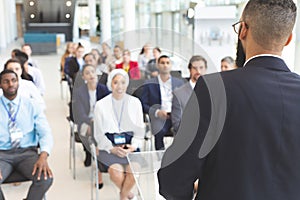 Male speaker speaks in a business seminar