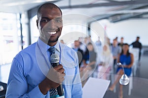 Male speaker speaks in business seminar at conference meeting