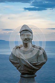 Male statue from the belvedere, the so-called Terrazza dell`infinito, The Terrace of Infinity seen on the sunset, Villa Cimbrone, photo