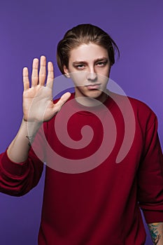 Male with stop hand gesture. Protest emotion