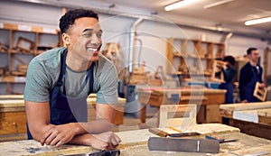 Male Student Studying For Carpentry Apprenticeship At College photo