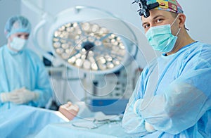 Male surgeon on background in operation room