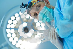 Male surgeon on background in operation room