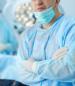 Male surgeon on background in operation room