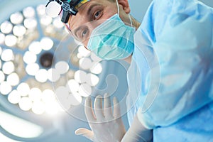 Male surgeon on background in operation room