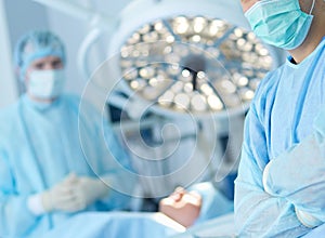 Male surgeon on background in operation room