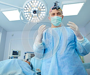 Male surgeon on background in operation room