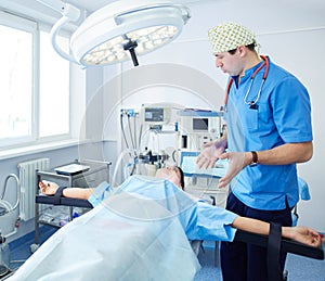 Male surgeon on background in operation room