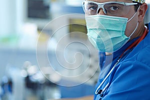 Male surgeon on background in operation room