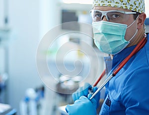 Male surgeon on background in operation room