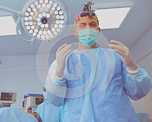 Male surgeon on background in operation room