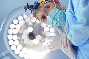 Male surgeon on background in operation room