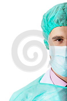 Male surgeon in protective mask.