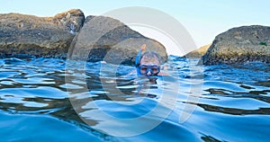 Male swim in the summer sea