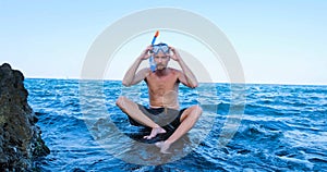 Male swim in the summer sea