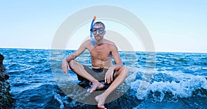 Male swim in the summer sea