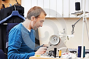 Male tailor at work