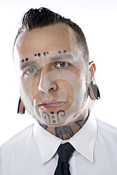 Male with tattoos wearing tie photo