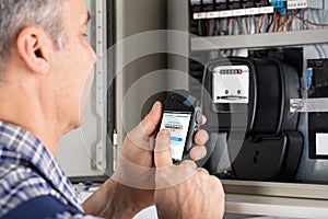 Male Technician Doing Meter Reading