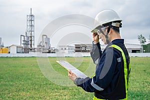 Male technician watching work program