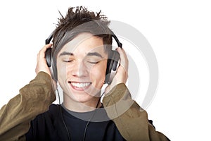 Male Teenager listening to music via headphone