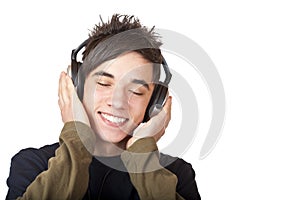 Male Teenager listening to music via headphone