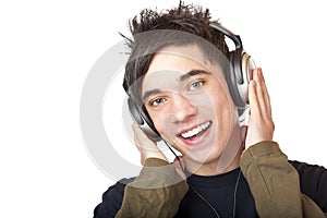 Male Teenager listening to music via headphone