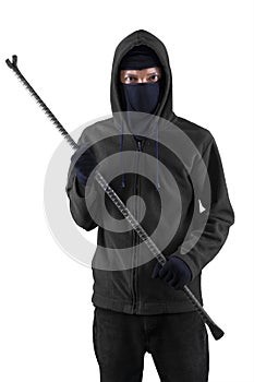 Male thief holding crowbar