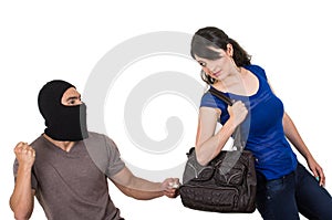 Male thief robbing beautiful young girl photo