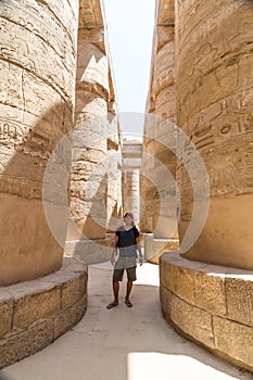 Male Tourist at Temples of Karnak, ancient Thebes in Luxor, Egypt photo