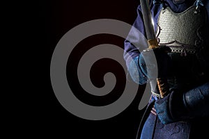 Male in tradition kendo armor