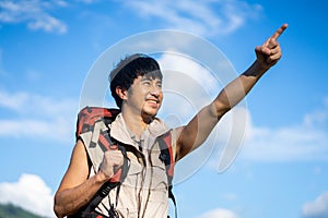 The male traveler raised his hand to the sky. Ready to travel to travel