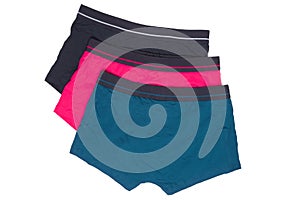 Male underwear isolated. Close-up of three casual boxer shorts isolated on a white background. Clipping path included. Fashionable