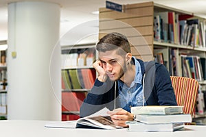 Male university student in the library