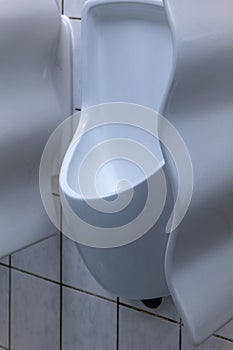 male urinal from a public toilet