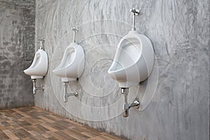 Male urinal sanitary ware in office modern loft photo