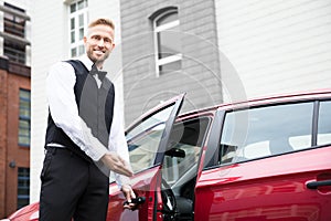 Male Valet Opening Car Door