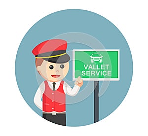 Male valet services standing with valet service sign