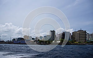 Male view of the city from the ocean