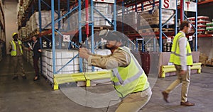 Male warehouse worker using VR headset and controller in loading bay 4k